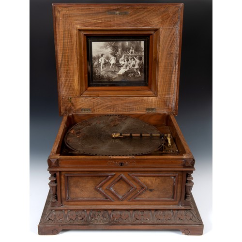 189 - A late 19th century table top Polyphon, 11986, playing 40 cm discs, in a walnut case, some loss, att... 