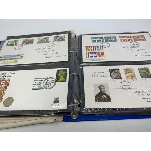 167 - A large group of First Day Covers, in numerous albums, and a small group of presentation packs, in a... 