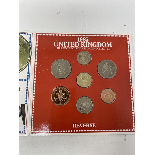 31 - A run of Brilliant Uncirculated Coin Collection year packs, 1984-2000