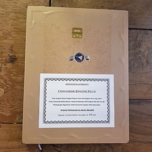 591 - Concorde memorabilia:  Concorde Engine Plug, mounted with a photograph signed by Chief Concorde Capt... 