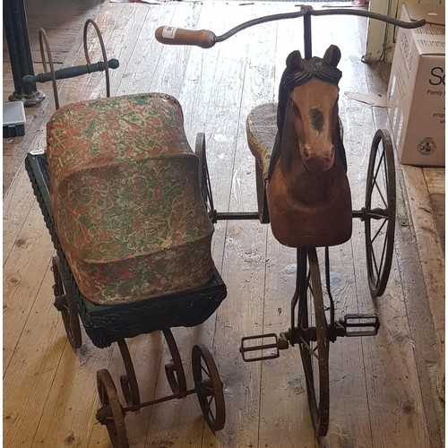 336 - A child's tricycle, with carved wooden seat in the form of a horse, 86 cm and a dolls pram (2)