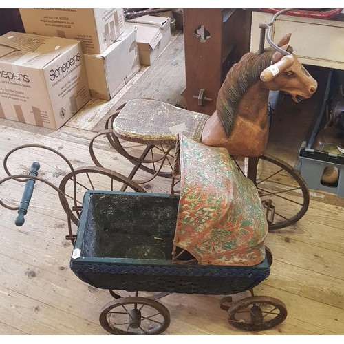 336 - A child's tricycle, with carved wooden seat in the form of a horse, 86 cm and a dolls pram (2)