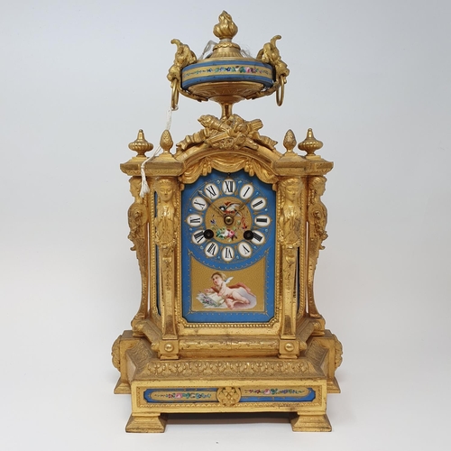 194 - A late 19th century mantel clock, the 8.5 cm wide porcelain dial with Roman numerals and painted a c... 