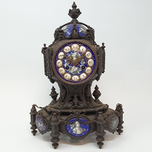 202 - A late 19th century Continental mantel clock, the 8.5 cm diameter enamel dial with Roman numerals an... 