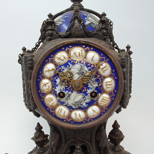 202 - A late 19th century Continental mantel clock, the 8.5 cm diameter enamel dial with Roman numerals an... 