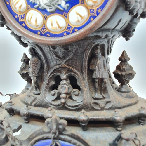 202 - A late 19th century Continental mantel clock, the 8.5 cm diameter enamel dial with Roman numerals an... 