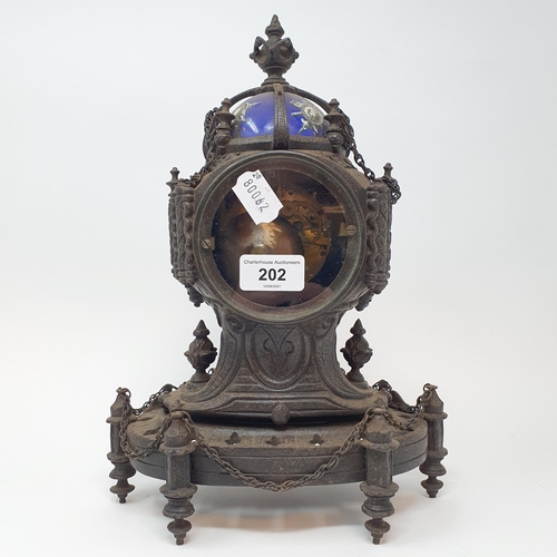 202 - A late 19th century Continental mantel clock, the 8.5 cm diameter enamel dial with Roman numerals an... 