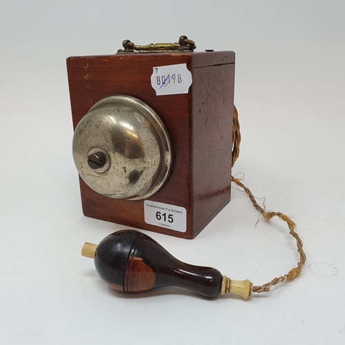 615 - A portable bell, with wooden bell push, with ivory handle, 11 cm wide