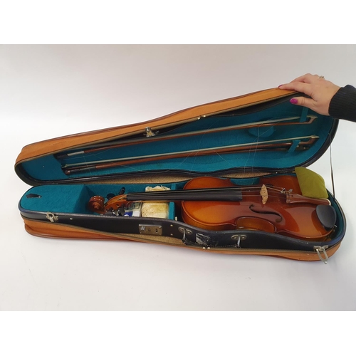 619 - A Chinese violin, with a two piece back, three bows, in case and a miniature violin and bow, in a ca... 