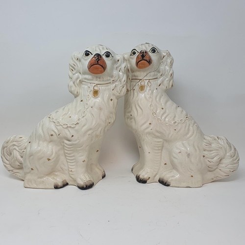 552 - A pair of Staffordshire flat back spaniels, a Royal Doulton part dinner service, other ceramics and ...