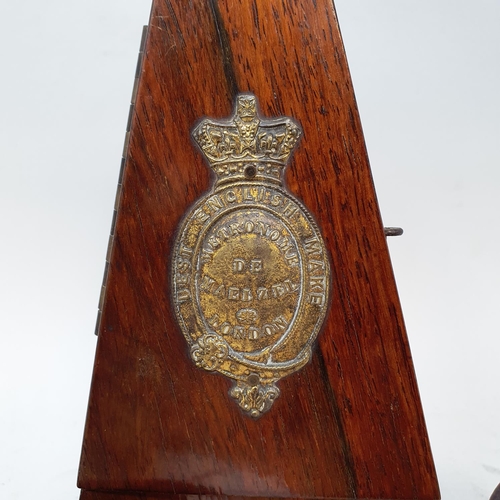 601 - An early 20th century metronome, in a rosewood case, nine glass measures in leather cases and other ... 