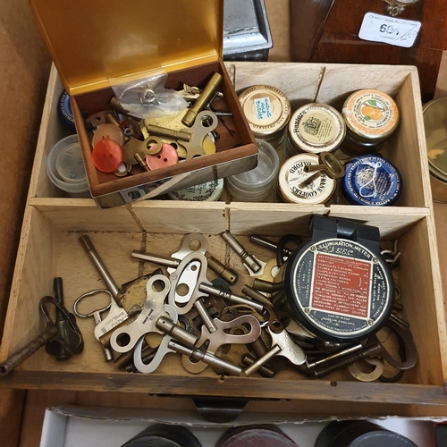 601 - An early 20th century metronome, in a rosewood case, nine glass measures in leather cases and other ... 