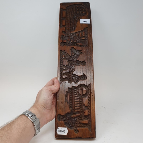 605 - A treen gingerbread mould, 50 cm