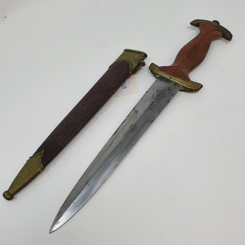 11 - A Third Reich SA dagger the blade marked Rob Giersch, Solingen, with a scabbard, stamped 15/25063, a...