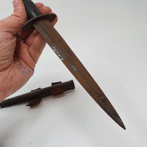 14 - A Fairbairn & Sykes style Commando fighting knife, with a scabbard
Provenance: belonged to the vendo...