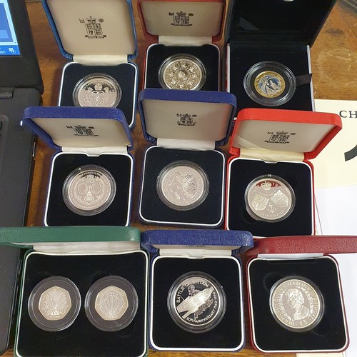 103 - A London 2012 Handover to Rio silver proof £2 coin, and other proof coins, all boxed