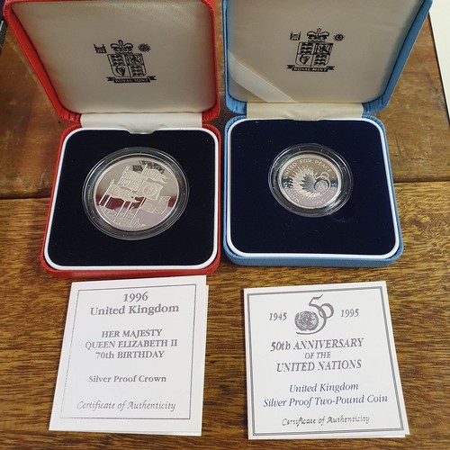 103 - A London 2012 Handover to Rio silver proof £2 coin, and other proof coins, all boxed