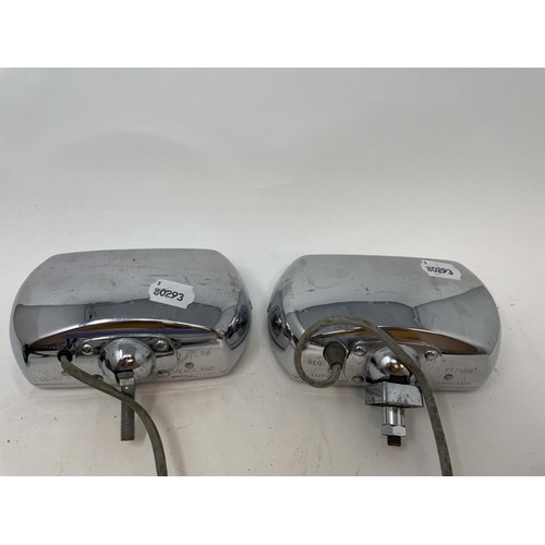 9 - A pair of Lucas Quartz-Halogen driving lamps, with covers, a Cibie driving lamp, with a cover, and a... 