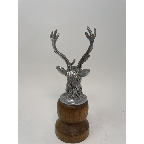 46 - A chrome car mascot, in the form of a stag, a chrome Jaguar leaping cat car mascot, and another masc... 