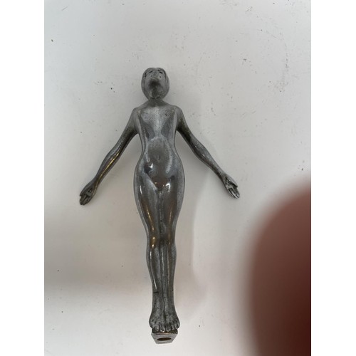 46 - A chrome car mascot, in the form of a stag, a chrome Jaguar leaping cat car mascot, and another masc... 