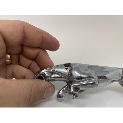 46 - A chrome car mascot, in the form of a stag, a chrome Jaguar leaping cat car mascot, and another masc... 