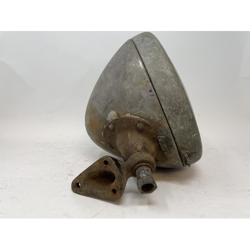 40 - Four headlamps, understood to be from a pre-war Ford, and four other headlamps (2 boxes)