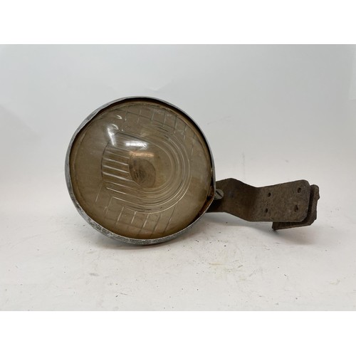 40 - Four headlamps, understood to be from a pre-war Ford, and four other headlamps (2 boxes)