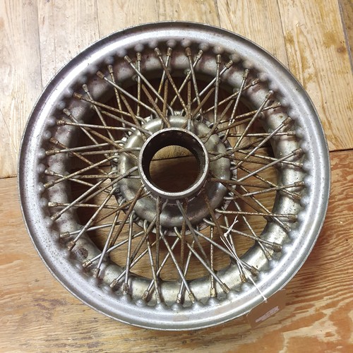 13 - A group of eight wire wheels, to fit Jaguar Mk II and other cars, some surface rust (8)