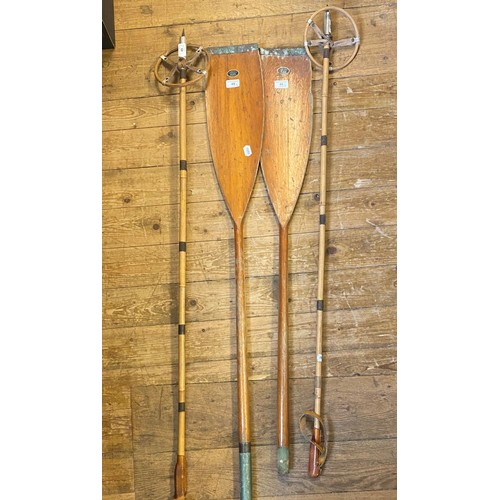 49 - A pair of collar paddles, a pair of early 20th century skiis and a pair of ski poles (6)