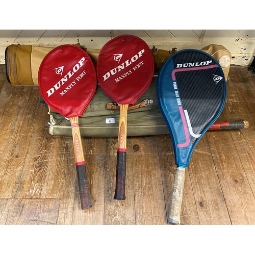 63 - Assorted sporting items, including tennis racquets, squash racquets, golf clubs, cricketing and othe... 