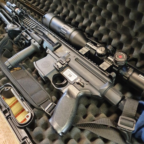 39 - A SIG Sauer .177 calibre CO2 air rifle with accessories including an EGSLNB scope, torch, laser and ... 