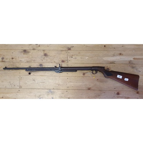 66 - A vintage under-lever air rifle