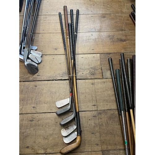 64 - Assorted vintage golf clubs (qty)