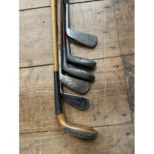 64 - Assorted vintage golf clubs (qty)