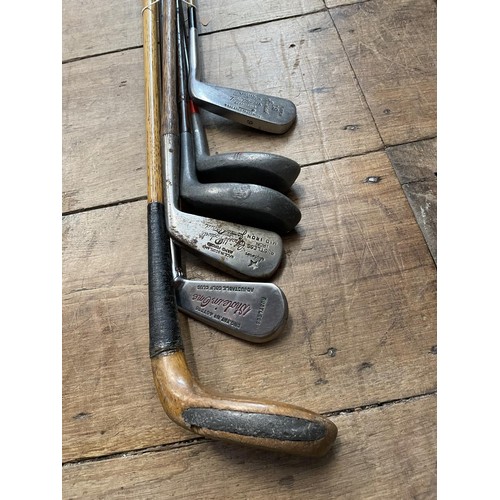 64 - Assorted vintage golf clubs (qty)