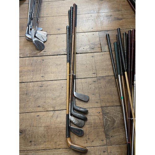 64 - Assorted vintage golf clubs (qty)