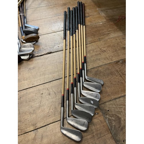 64 - Assorted vintage golf clubs (qty)