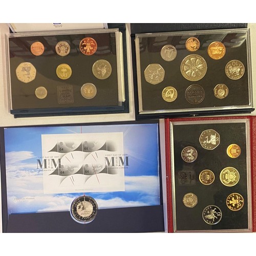 113 - Two year proof coins sets, 1986 & 1990, a Guernsey year proof coin set, 1986, two USA dollars, 1921,... 