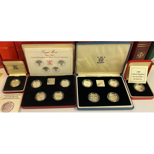 115 - A group of £1 silver proof coins, 1983-1987, 1989 & 1994-1997, in four cases (4)