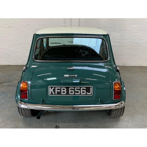 59 - 1971 Mini Cooper S Recreation 
Registration number KFB 656J 
Green with a white roof 
Black interior... 