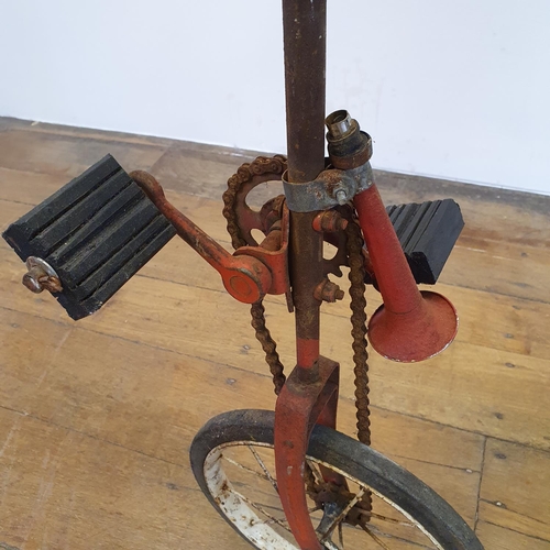 53 - A red painted unicycle, probably 1960s...