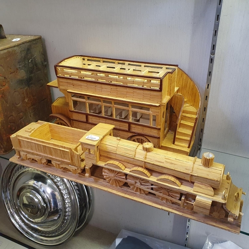 58 - Assorted ceramic and other model vehicles, a Stig helmet clock, a locomotive model, constructed from...