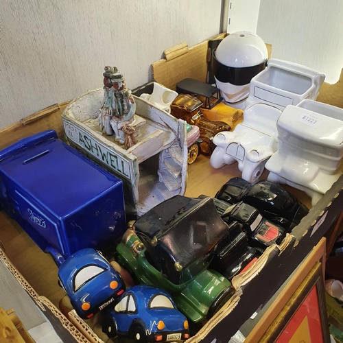 58 - Assorted ceramic and other model vehicles, a Stig helmet clock, a locomotive model, constructed from...