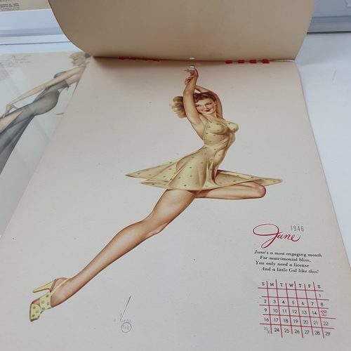 14 - A 1946 pin up calendar, with three of the months framed, 31 x 22 cm...