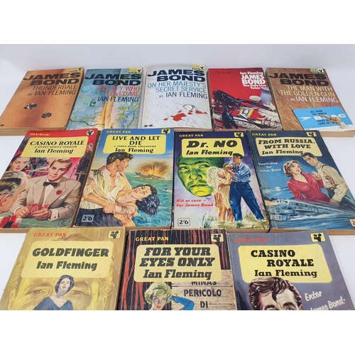 21 - Fleming (Ian), Thrilling Cities, various other paperback James Bond books, annuals and two posters (...