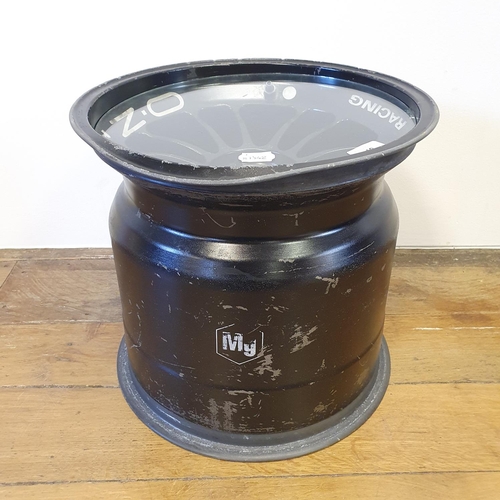 40 - An F1 BAR British American Racing wheel, used and dented by Jenson Button and signed by him while he...