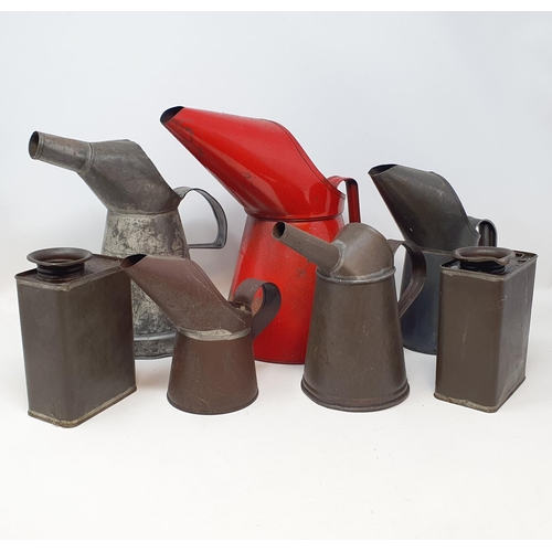 48 - A red painted oil can, 26 cm high, six other oil cans, and a commercial vehicle wing mirror (box)...