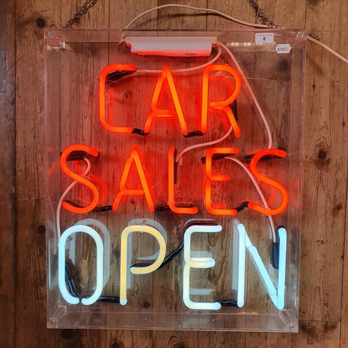 8 - A modern neon sign, CAR SALES OPEN, in a perspex case, 66 cm high x 56 cm wide...