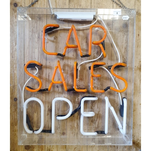 8 - A modern neon sign, CAR SALES OPEN, in a perspex case, 66 cm high x 56 cm wide...
