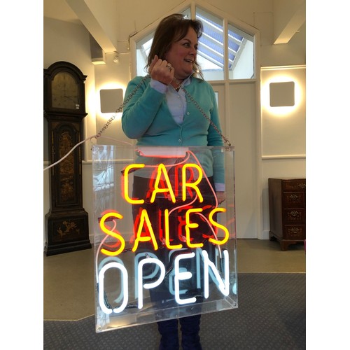 8 - A modern neon sign, CAR SALES OPEN, in a perspex case, 66 cm high x 56 cm wide...